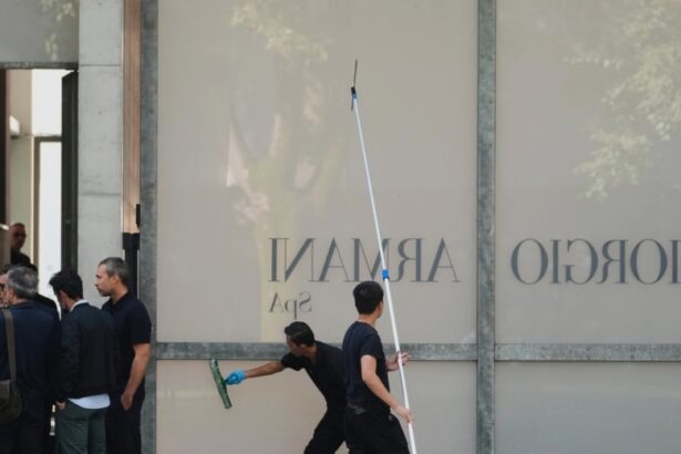 crowds gather outside giorgio armanis milan hq to pay respects before funeral 68bb1593e5a85